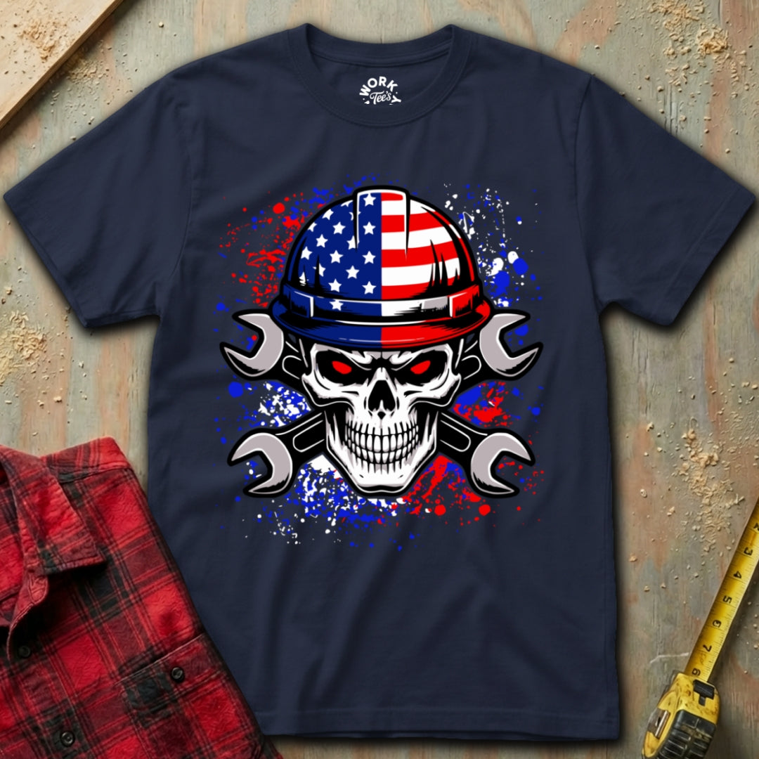 Navy blue t-shirt with a skull wearing an American flag hard hat design on a textured surface.
