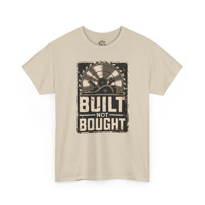 Beige t-shirt with a graphic design and text 'Built Not Bought' on a white background