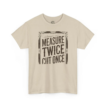 Beige t-shirt with black text 'Measure Twice, Cut Once' on a white background