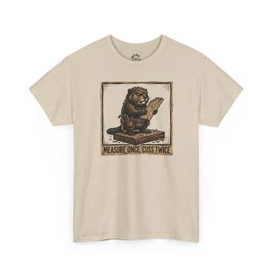 Beige t-shirt with graphic design of a lion holding a measuring stick and text on a white background