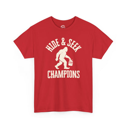 Red t-shirt with 'Hide & Seek Champions' graphic on a white background