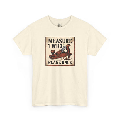 Beige t-shirt with a graphic design of a plane and text 'Measure Twice, Plane Once' on a white background.