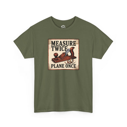 Green t-shirt with a graphic and text 'Measure Twice, Plane Once' on a white background