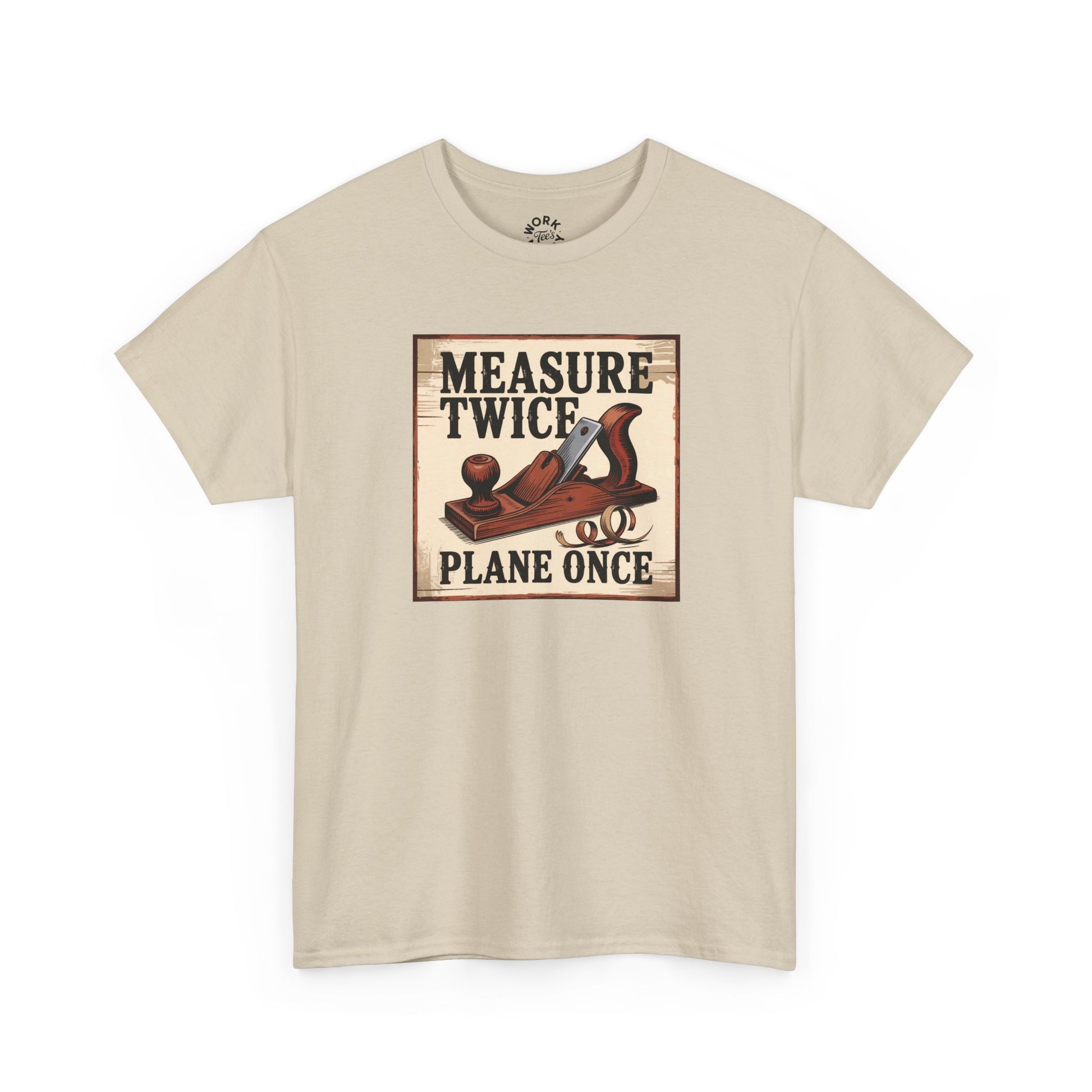 Beige t-shirt with a graphic of a plane and text 'Measure Twice, Plane Once' on a white background