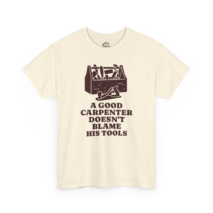 Beige t-shirt with a graphic of tools and text on a white background