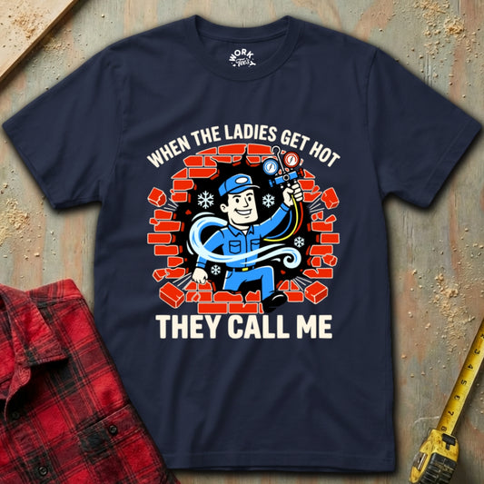 Navy blue t-shirt with a graphic of a bricklayer and text on a textured surface.