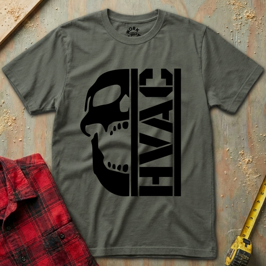 Gray t-shirt with black skull and 'EVAC' graphic on a textured surface with red plaid shirt and yellow tool in background
