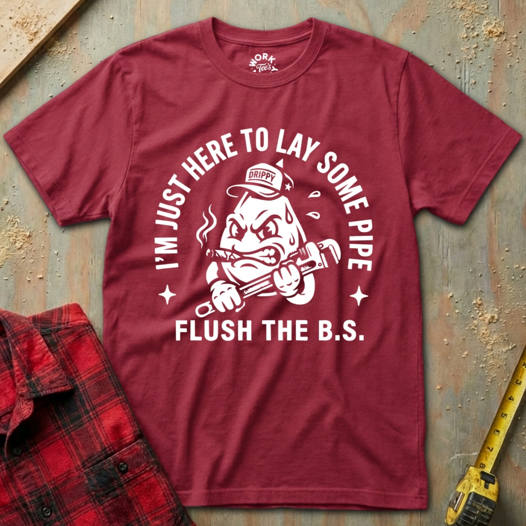 Red t-shirt with graphic design and text on a textured surface