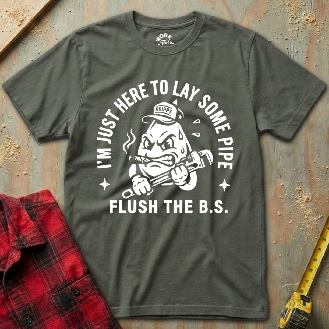 Green t-shirt with graphic design and text on a rustic background