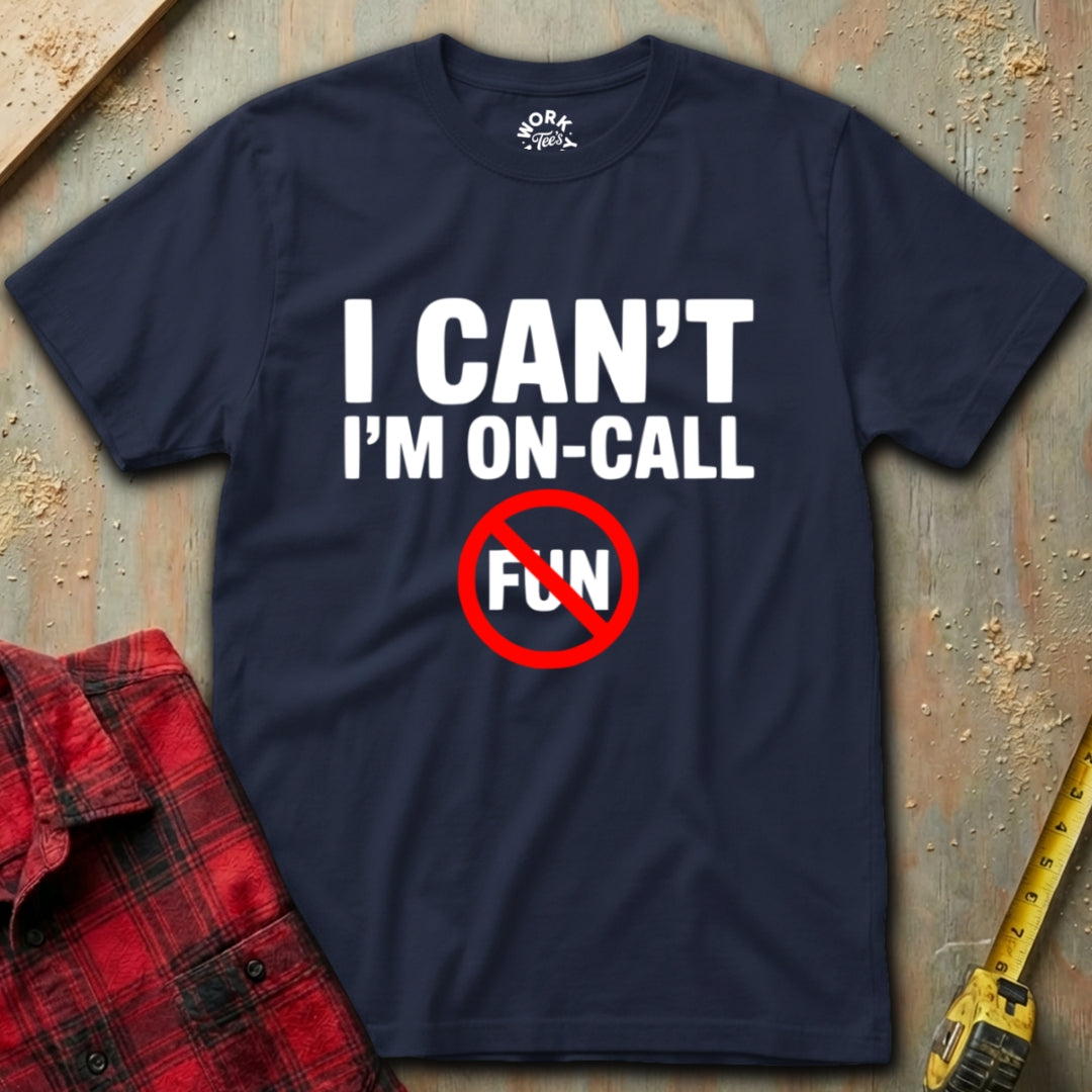 Navy Blue 'I Can't I'm On Call' T'shirt on plywood background