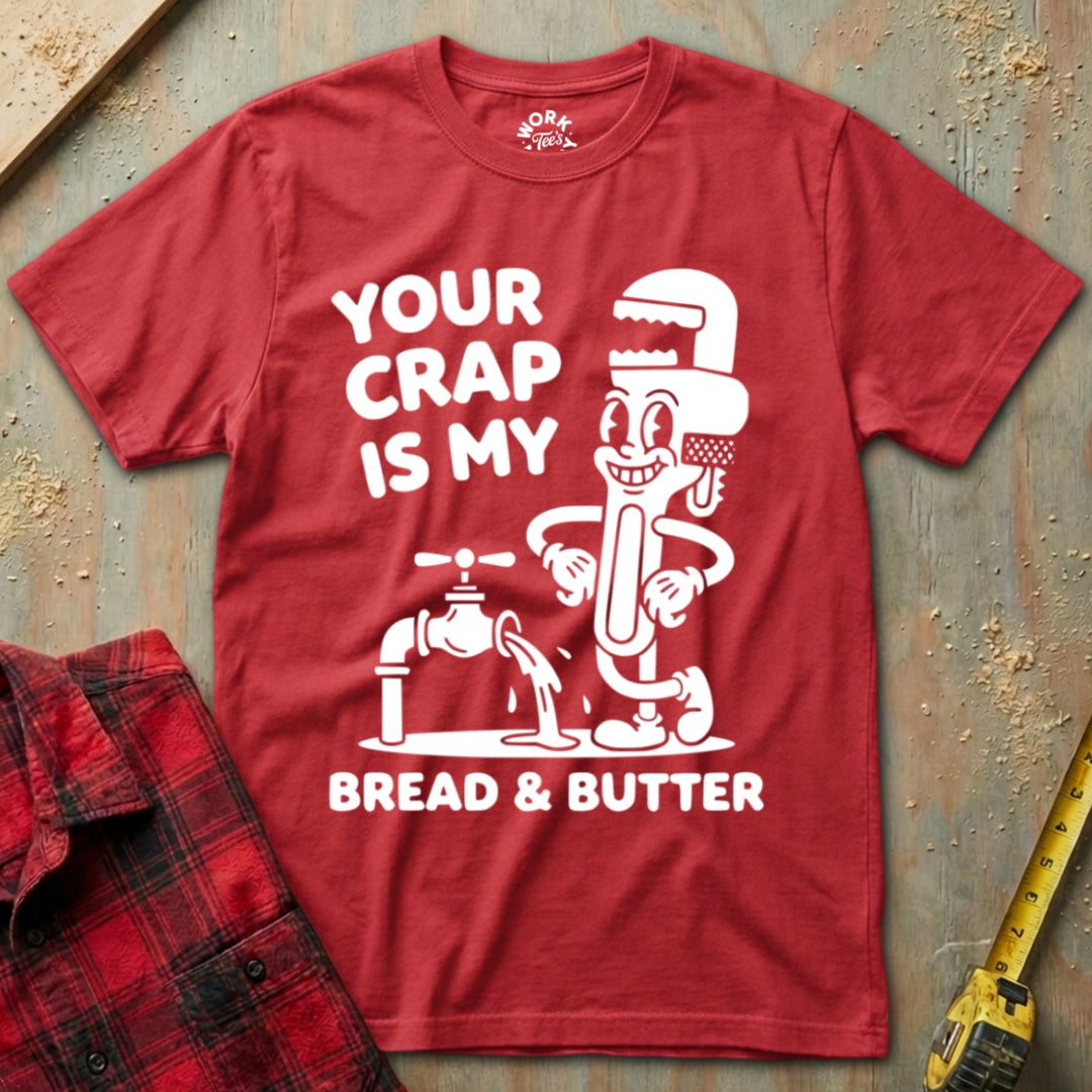 Red t-shirt with white graphic and text on a textured surface
