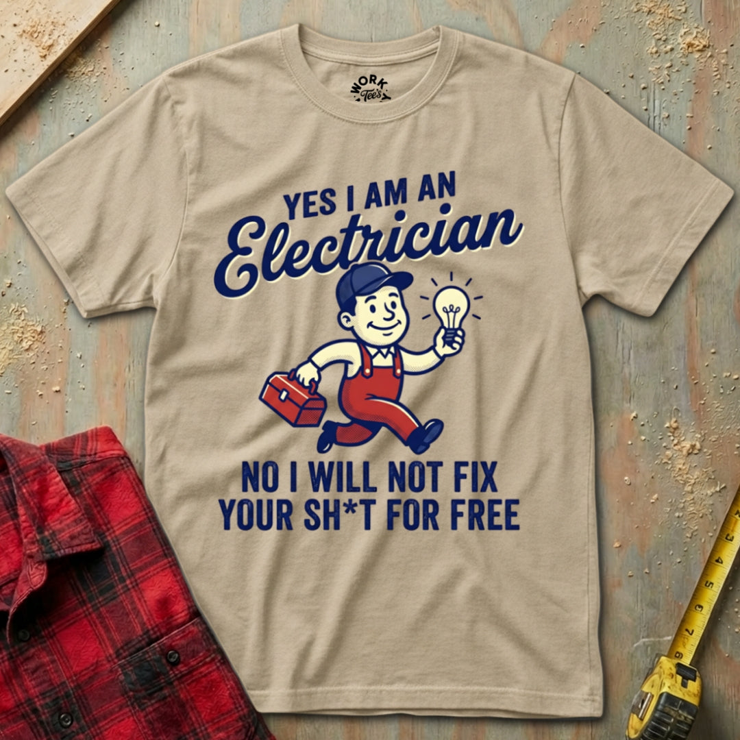 Beige t-shirt with electrician graphic and text on a wooden background