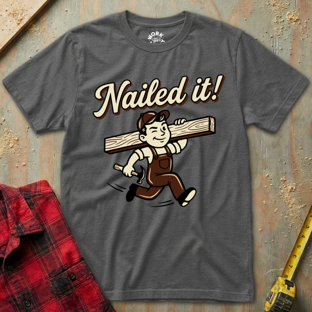 Gray t-shirt with 'Nailed it!' graphic on a wooden background
