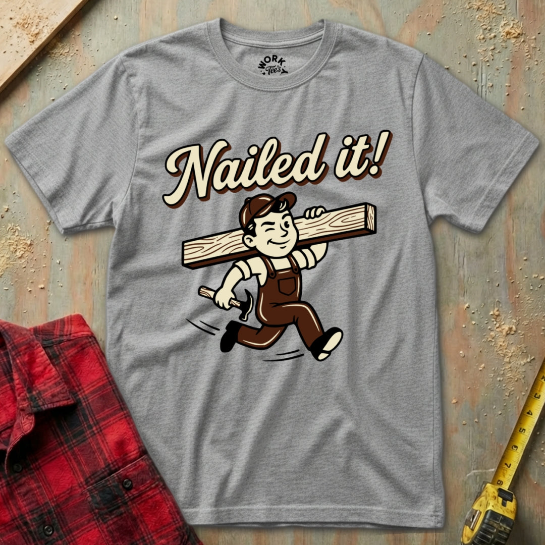 Gray t-shirt with 'Nailed it!' graphic on a wooden background