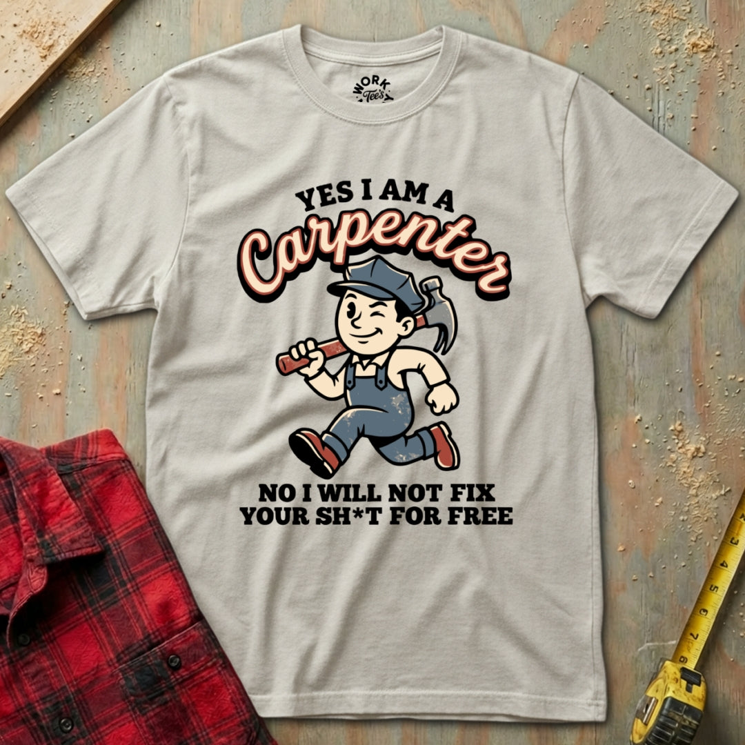 Gray t-shirt with a cartoon carpenter graphic and text on a wooden background