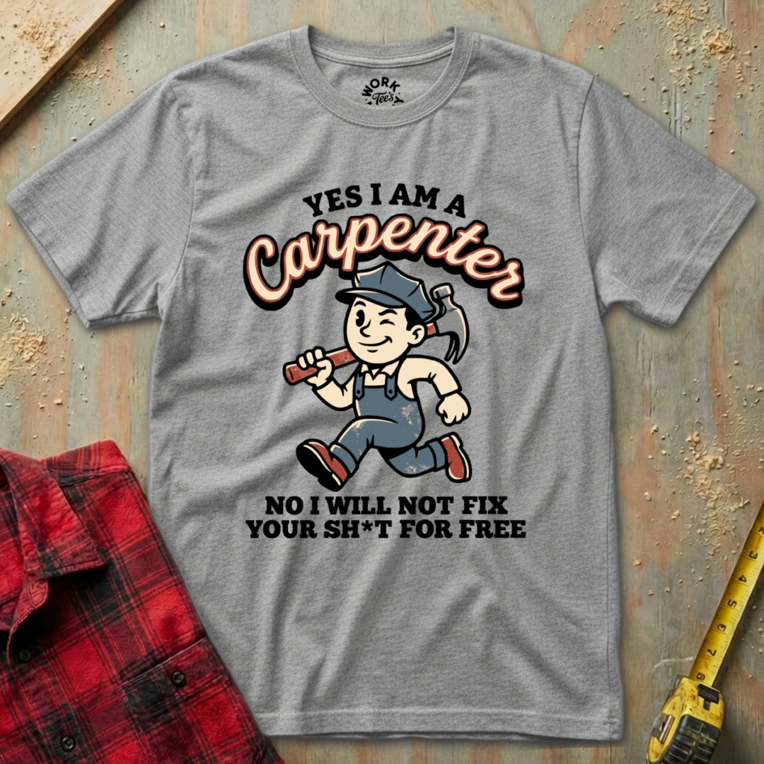 Gray t-shirt with a cartoon carpenter graphic and text on a wooden background