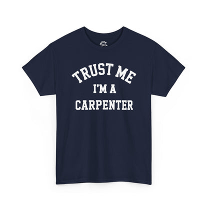 Navy blue t-shirt with 'Trust Me I'm a Carpenter' text on a white background