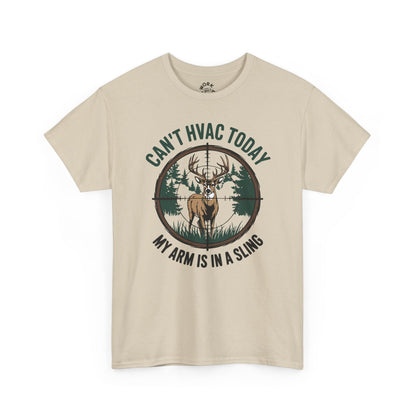 Beige t-shirt with a graphic of a deer and text 'Can't HVAC Today, My Arm is in a Sling' on a white background