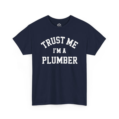 Navy blue t-shirt with 'Trust Me I'm a Plumber' text on a white background