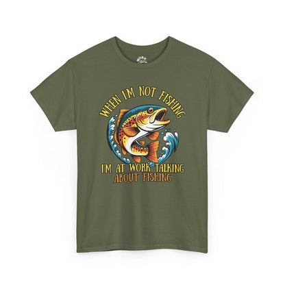 Green t-shirt with fishing graphic and text on a white background