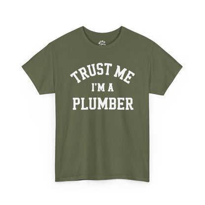 Green t-shirt with 'Trust Me I'm a Plumber' text on a white background