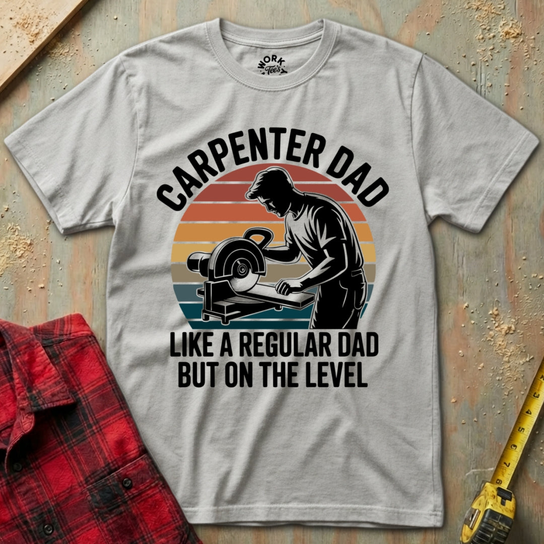 Gray t-shirt with 'Carpenter Dad' graphic and text on a wooden background
