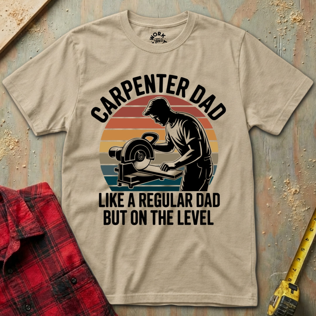 Beige t-shirt with 'Carpenter Dad' graphic and text on a wooden background
