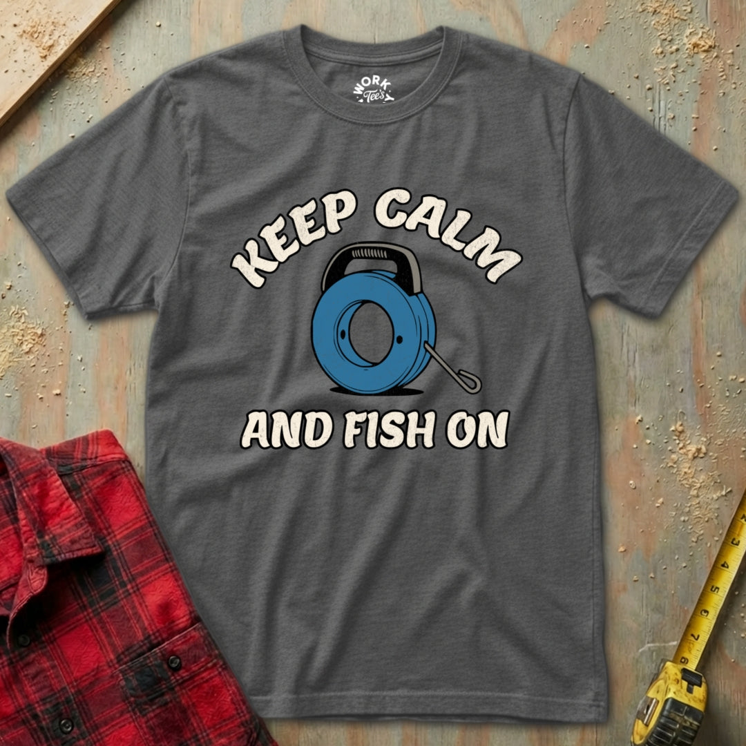 Gray t-shirt with 'Keep Calm and Fish On' graphic on a rustic wooden background