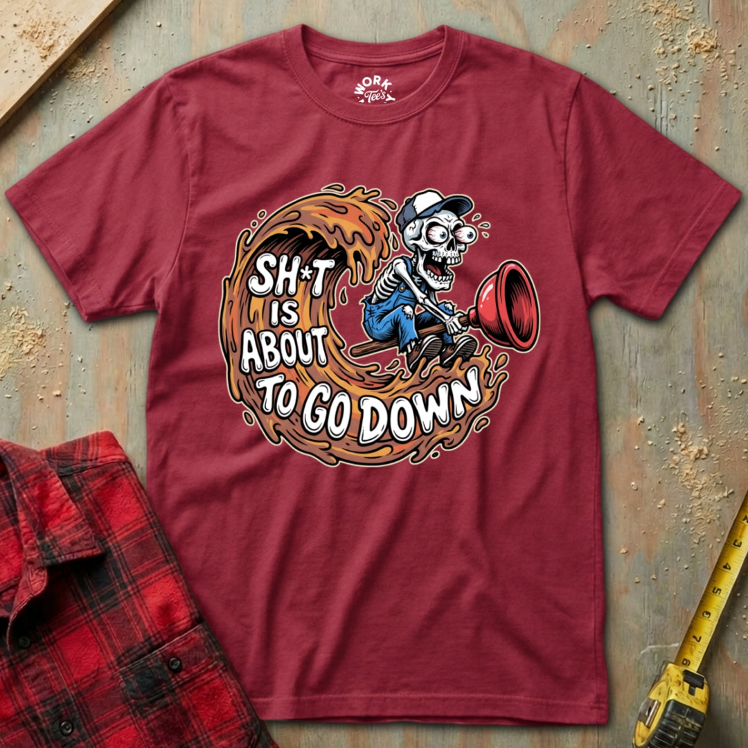 Red t-shirt with a graphic design and text on a textured surface