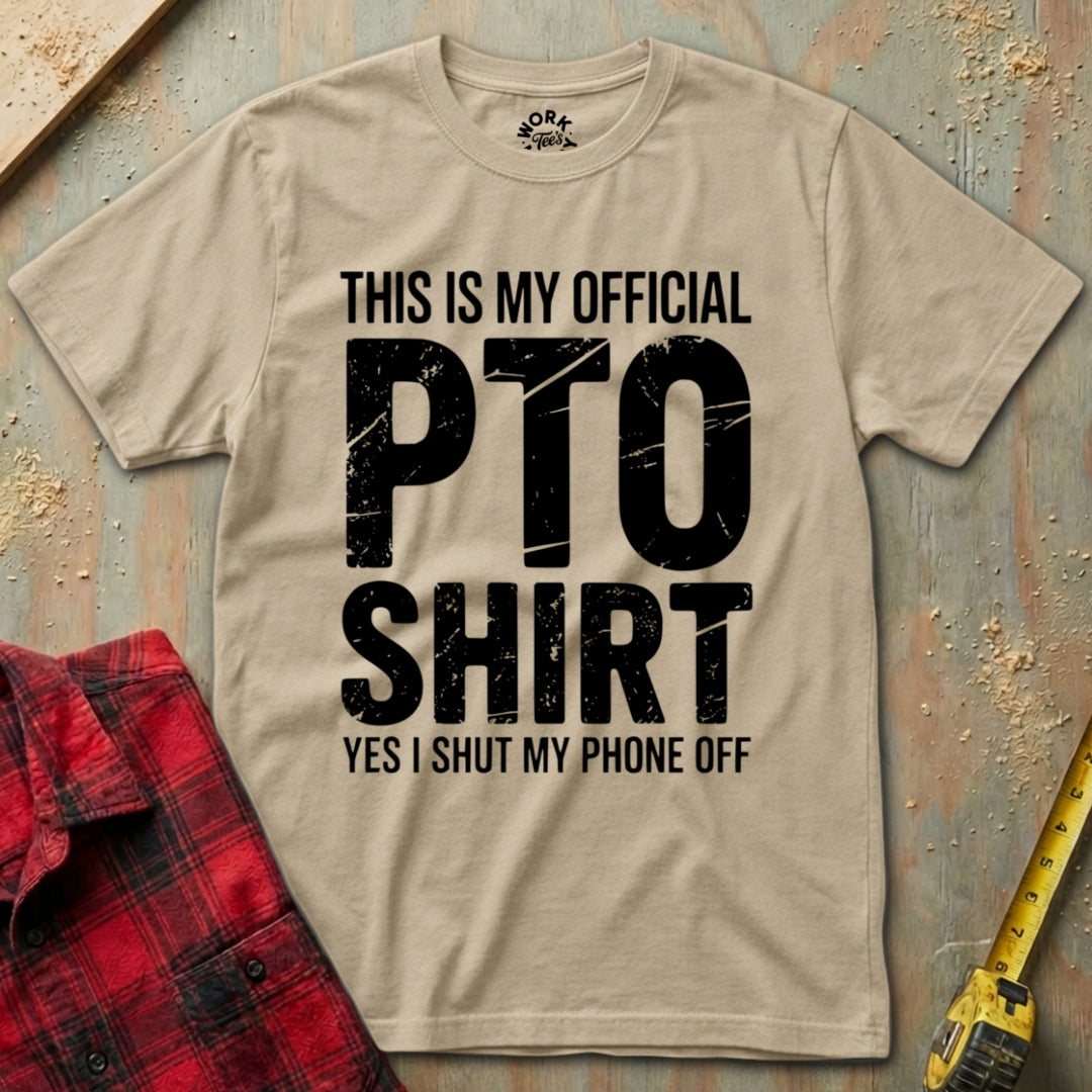 Beige t-shirt with 'This is my official PTO shirt' text on a wooden background