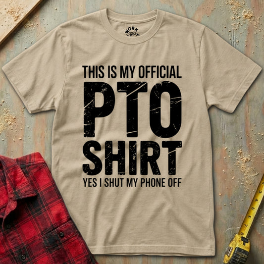 Beige t-shirt with 'This is my official PTO shirt' text on a wooden background