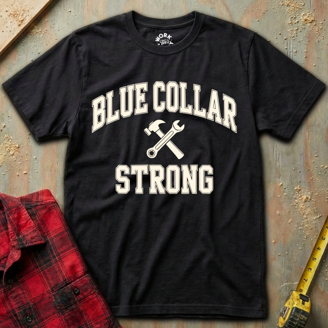 Black t-shirt with 'Blue Collar Strong' text and crossed wrenches on a textured surface.