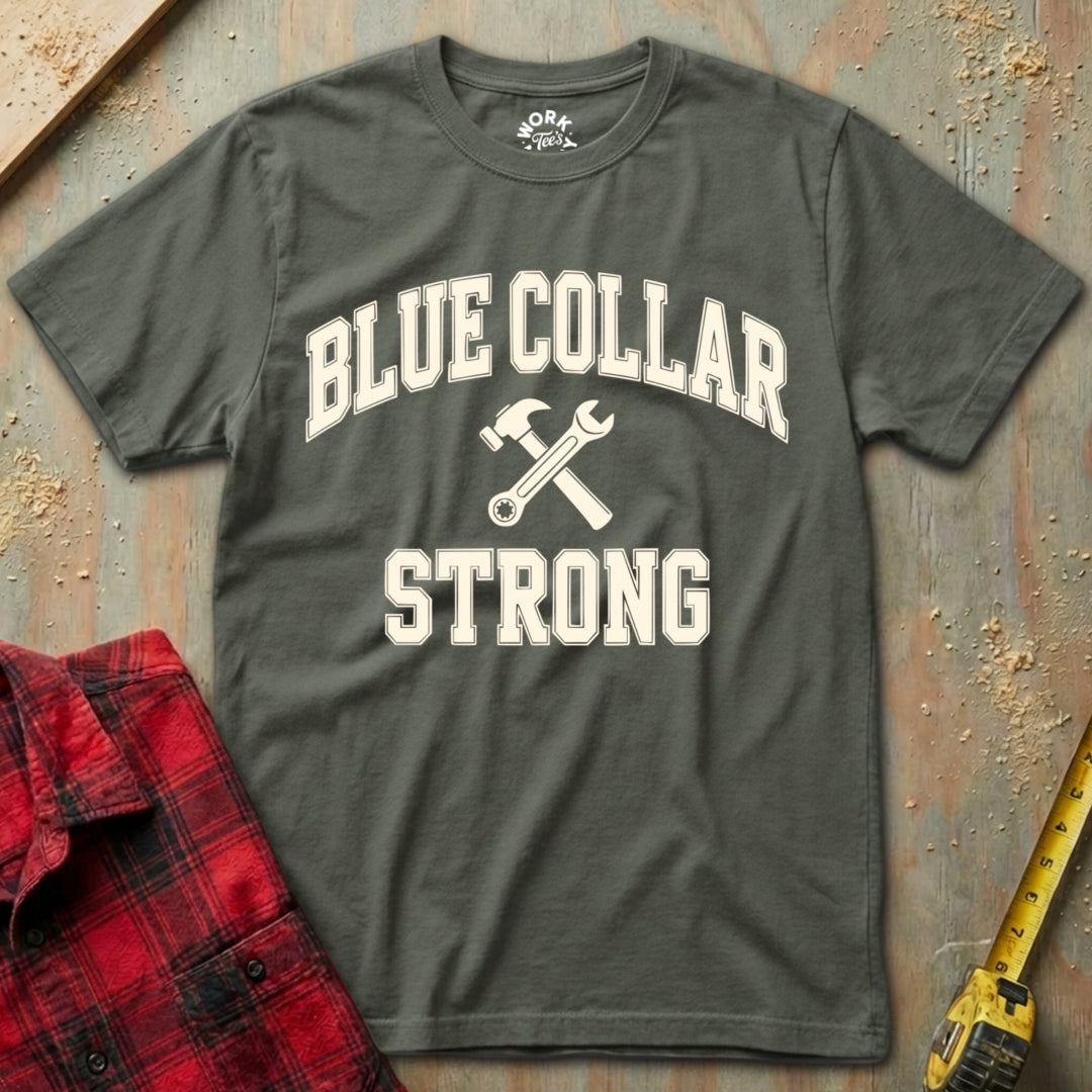 Gray t-shirt with 'Blue Collar Strong' text and tools on a rustic background